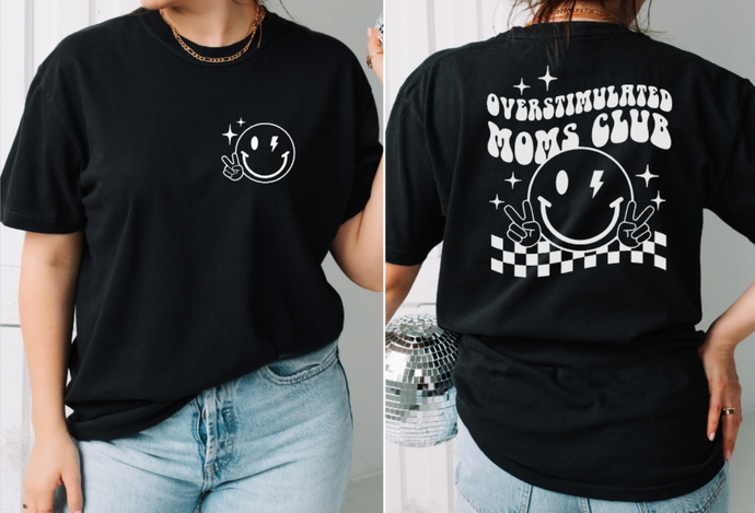 Trendy overstimulated Moms club smiley face graphic tee. 