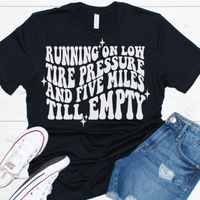 Low tire pressure and 5 miles till empty women's graphic tee
